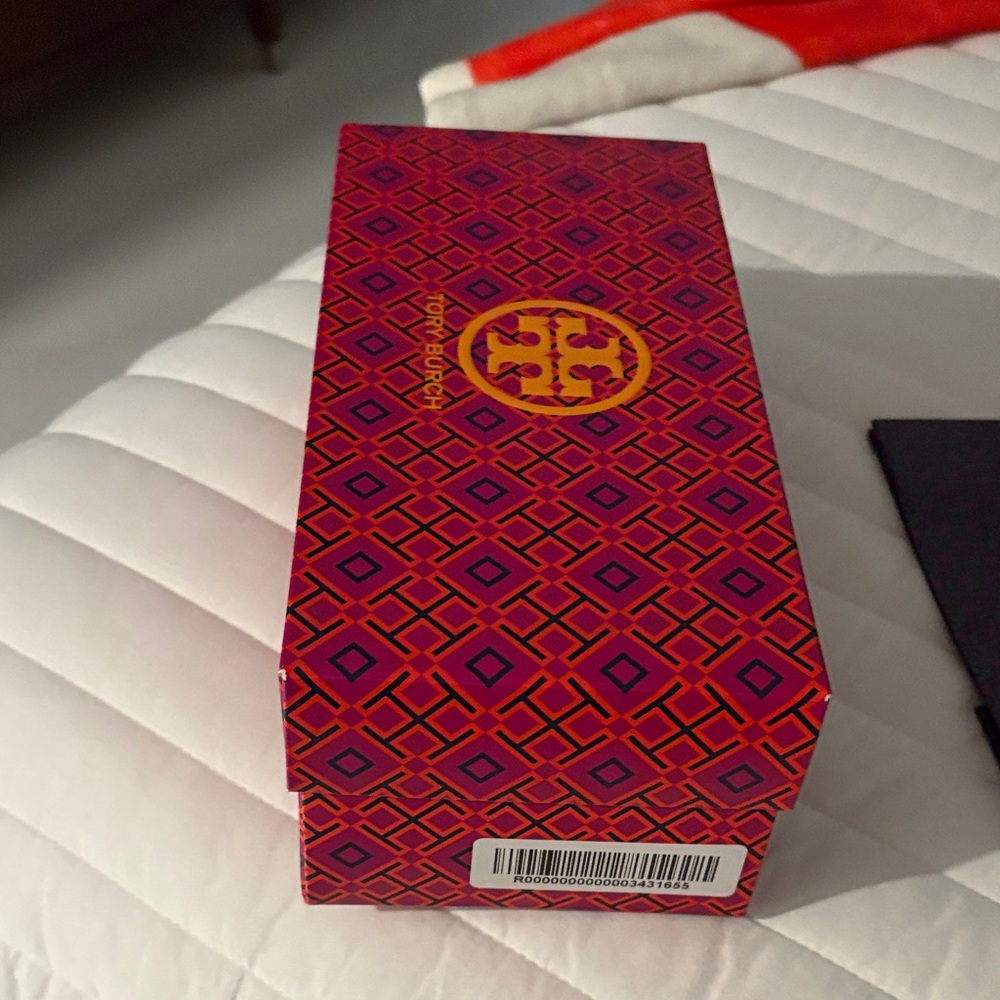 Several Tory Burch shoeboxes and Bags